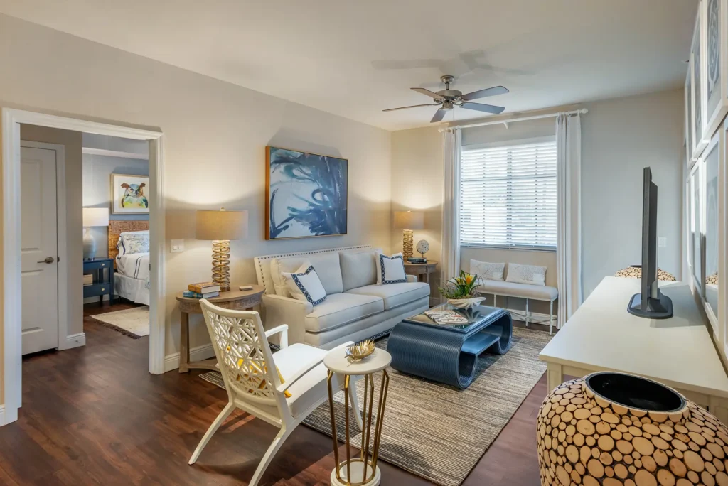 Living room with wood style floor and ceiling fan